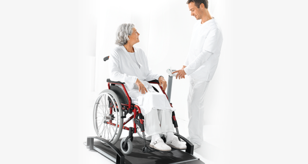 Seca 664 EMR-validated digital wheelchair scale with upright arm display